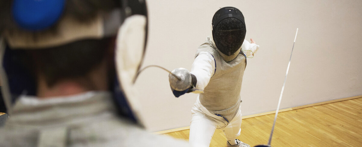 two people fencing